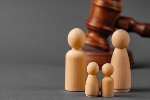 wooden toy family and judge mallet family divorce