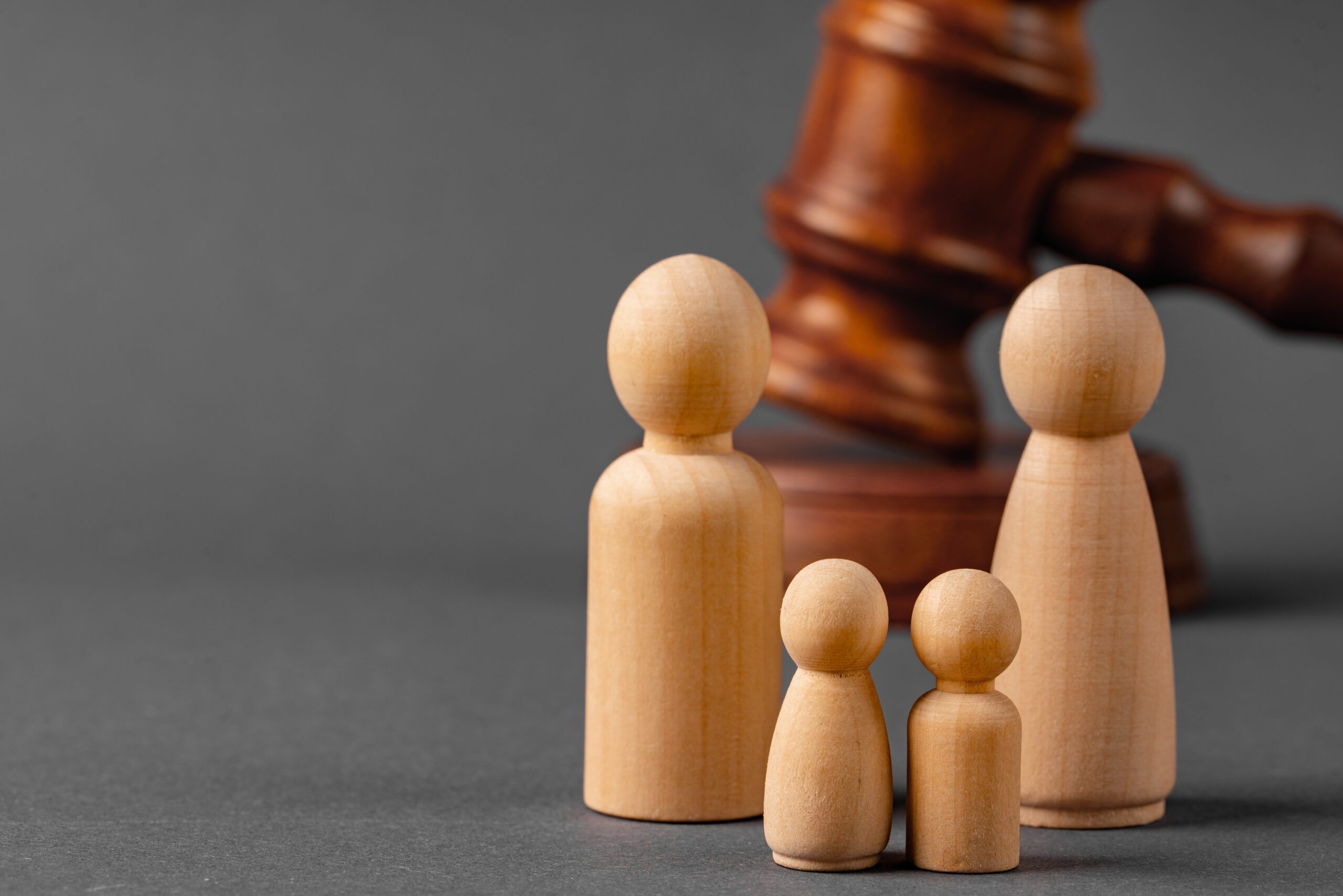 wooden toy family and judge mallet family divorce